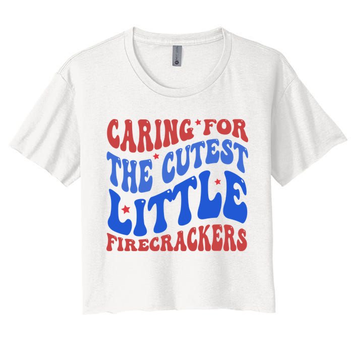 Caring For The Cutest Little Firecrackers 4th Of July Women's Crop Top Tee