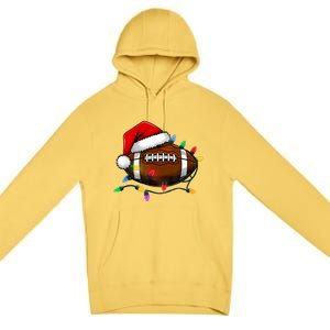 Christmas Football With Santa Hat Christmas Football Player Premium Pullover Hoodie