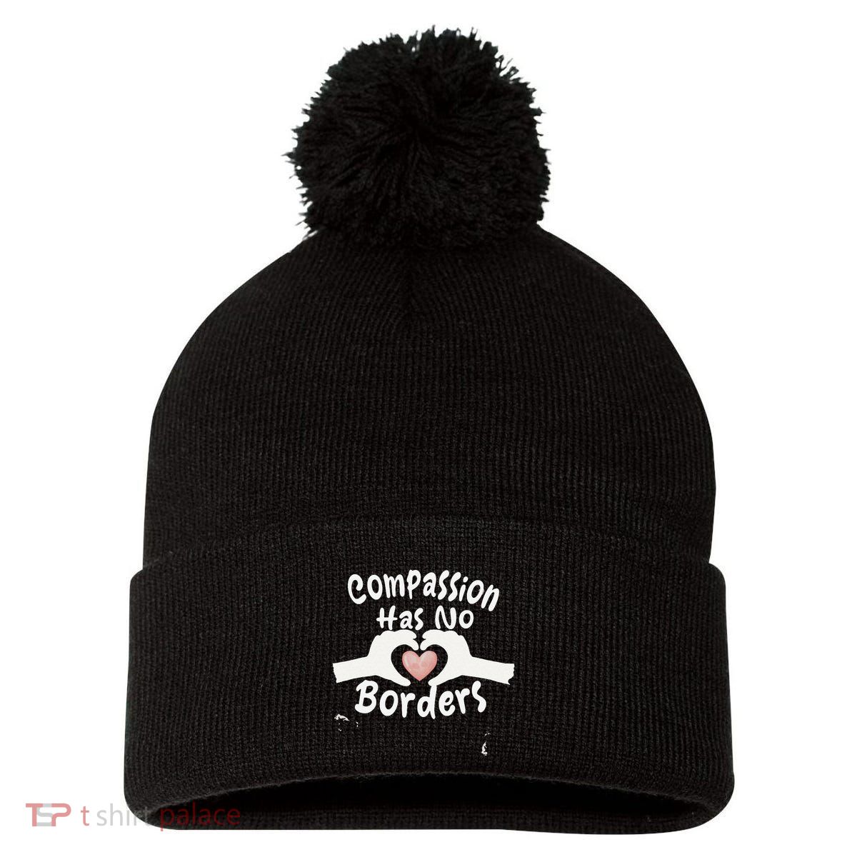 Compassion Has No Borders Pom Pom 12in Knit Beanie