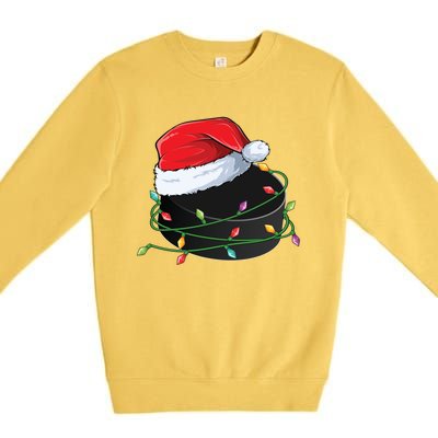 Christmas Hockey Puck In Santa Hat Wrapped In Holiday Lights Cool Gift Premium Crewneck Sweatshirt