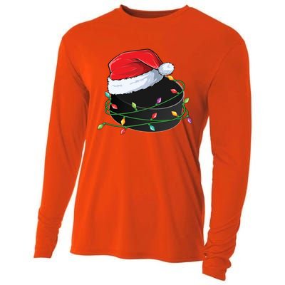 Christmas Hockey Puck In Santa Hat Wrapped In Holiday Lights Cool Gift Cooling Performance Long Sleeve Crew