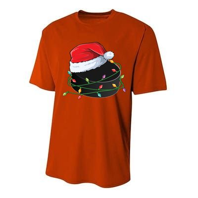 Christmas Hockey Puck In Santa Hat Wrapped In Holiday Lights Cool Gift Performance Sprint T-Shirt