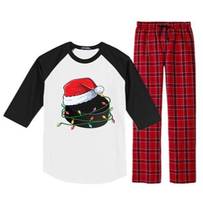 Christmas Hockey Puck In Santa Hat Wrapped In Holiday Lights Cool Gift Raglan Sleeve Pajama Set