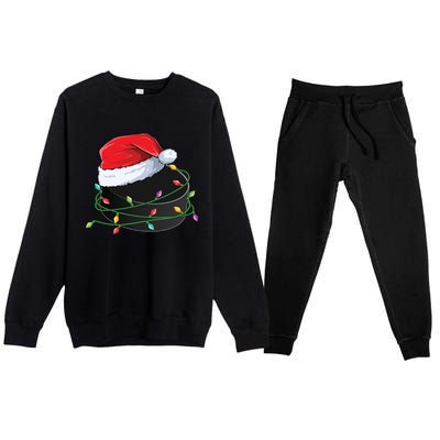 Christmas Hockey Puck In Santa Hat Wrapped In Holiday Lights Cool Gift Premium Crewneck Sweatsuit Set