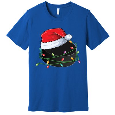 Christmas Hockey Puck In Santa Hat Wrapped In Holiday Lights Cool Gift Premium T-Shirt