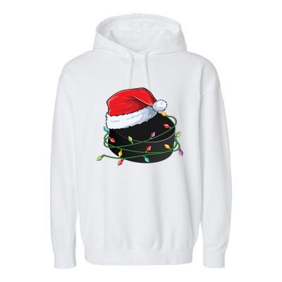 Christmas Hockey Puck In Santa Hat Wrapped In Holiday Lights Cool Gift Garment-Dyed Fleece Hoodie