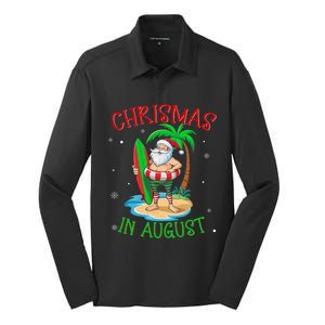 Christmas In August Funny Summer Santa On Beach Silk Touch Performance Long Sleeve Polo