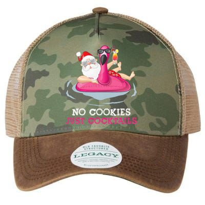 christmas in july no cookies just cocktails santa surfer Legacy Tie Dye Trucker Hat