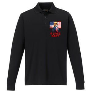 Cat In Suite With Trump Hair American Flag Nine Lives Baby Gift Performance Long Sleeve Polo