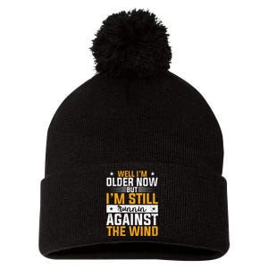 CHRISTIANITY I'm Still Running Against The Wind Pom Pom 12in Knit Beanie