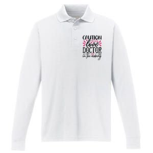 Caution Love Doctor In The Making Performance Long Sleeve Polo