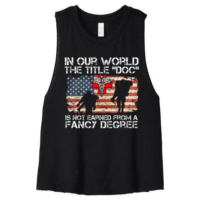 Combat Medic Title Doc Is Not Earned From A Fancy Degree Women's Racerback Cropped Tank