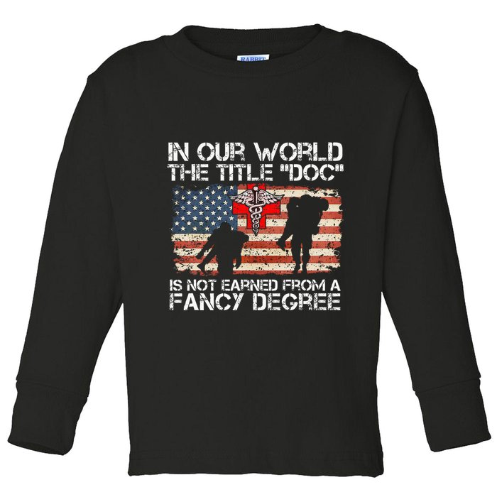 Combat Medic Title Doc Is Not Earned From A Fancy Degree Toddler Long Sleeve Shirt