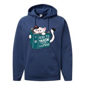 Cat Reading A Book How To Train Your Human Funny Cat Lovers Performance Fleece Hoodie