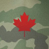 Canadian Red Maple Leaf Symbol Legacy Tie Dye Trucker Hat