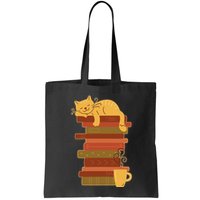 Cute Sleepy Cat On Book Stack And Coffee Tea Bag