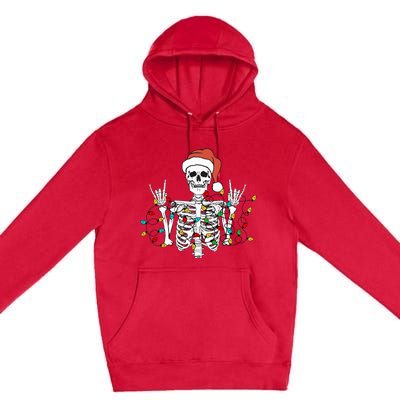 Christmas Skeleton Rocker Wrapped in Xmas Lights Santa Hat Premium Pullover Hoodie