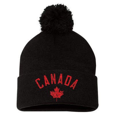 Canada Text And Leaf Distressed Red Print Pom Pom 12in Knit Beanie