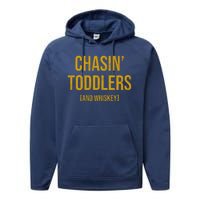 Chasin Toddlers And Whiskey Funny Parent Performance Fleece Hoodie