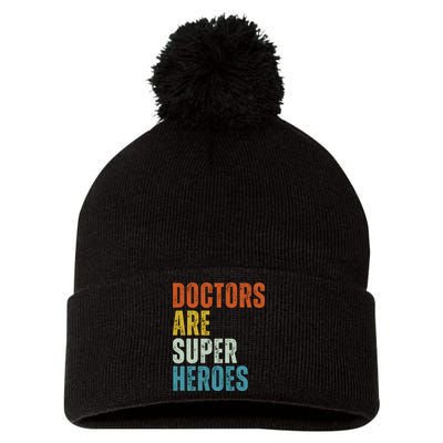 Doctors Are Super Heroes Pom Pom 12in Knit Beanie