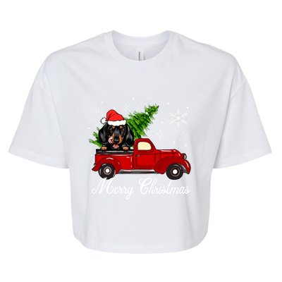 Dachshund Dog Riding Red Truck Christmas Decorations Bella+Canvas Jersey Crop Tee