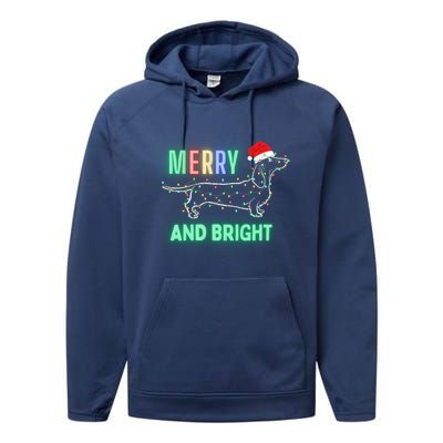 Dachshund In Christmas Lights Santa Hat Merry And Bright Meaningful Gift Performance Fleece Hoodie