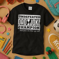 Dad Joke Champion Funny Father's Day Gift Bad Puns Kids T-Shirt