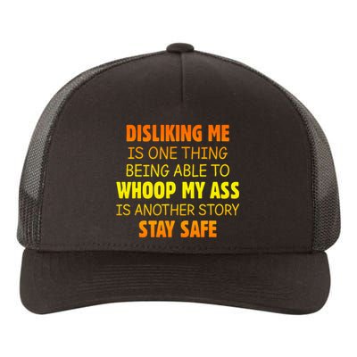 Disliking Me Is One Thing Being Able To Whoop My Ass Yupoong Adult 5-Panel Trucker Hat