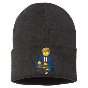 Donald Trump Building a Wall out of Toys Sustainable Knit Beanie