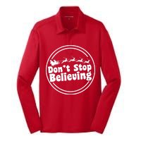 Don't Stop Believing Santa Sleigh Christmas Silk Touch Performance Long Sleeve Polo