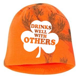 Drinks Well With Others Funny St. Patrick's Day Drinking Kati - Camo Knit Beanie