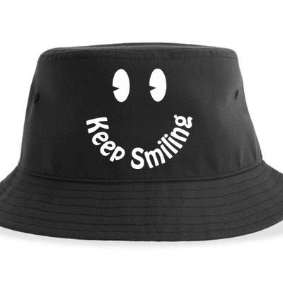 Devon Rodriguez Wearing Keep Smiling Sustainable Bucket Hat