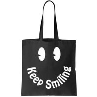 Devon Rodriguez Wearing Keep Smiling Bag