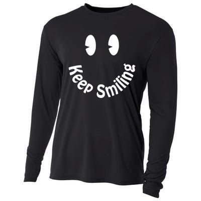 Devon Rodriguez Wearing Keep Smiling Cooling Performance Long Sleeve Crew