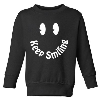 Devon Rodriguez Wearing Keep Smiling Toddler Sweatshirt