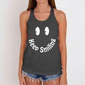 Devon Rodriguez Wearing Keep Smiling Women's Knotted Racerback Tank