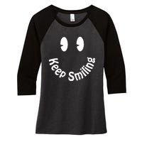 Devon Rodriguez Wearing Keep Smiling Women's Tri-Blend 3/4-Sleeve Raglan Shirt