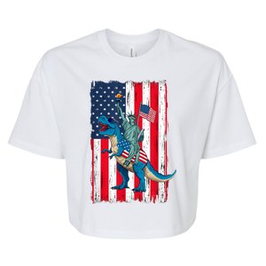 Dino Statue Of Liberty 4th Of July American Flag Bella+Canvas Jersey Crop Tee