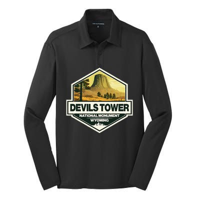 Devils Tower National Monument Wyoming Travel Art Badge Silk Touch Performance Long Sleeve Polo