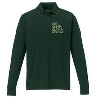 Eat Sleep Camp Repeat Camping Fan Performance Long Sleeve Polo