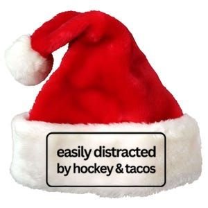 Easily Distracted By Hockey And Tacos Funny Hockey Players Premium Christmas Santa Hat