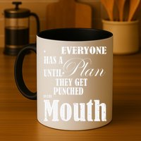 Everyone Has A Plan Until They Get Punched In The Mouth Mug