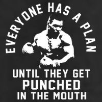 Everyone Has A Plan Until They Get Punched In The Mouth Golf Towel