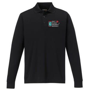 Eat Sleep Hockey Repeat Performance Long Sleeve Polo