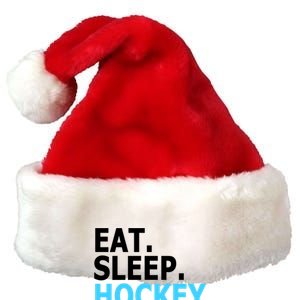 Eat. Sleep. Hockey. Premium Christmas Santa Hat