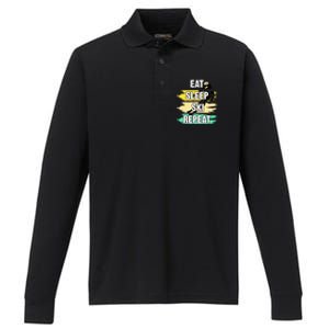 Eat Sleep Ski Repeat Performance Long Sleeve Polo