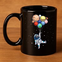 Funny Astronaut With Planets In Hand 11oz C Handle Ceramic Mug