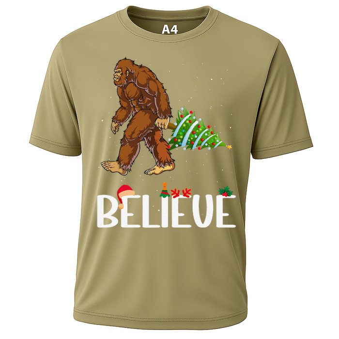 Funny Bigfoot Christmas Tree Lights Funny Sasquatch Believe Cooling Performance Crew T-Shirt