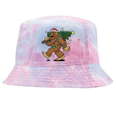 Funny Bigfoot Carrying Christmas Tree Holiday Sasquatch Tie-Dyed Bucket Hat