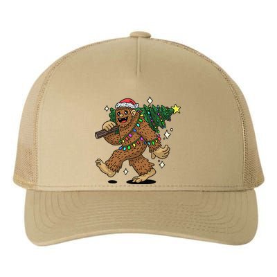 Funny Bigfoot Carrying Christmas Tree Holiday Sasquatch Yupoong Adult 5-Panel Trucker Hat